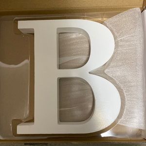 White letter B used once. Kept in box since.